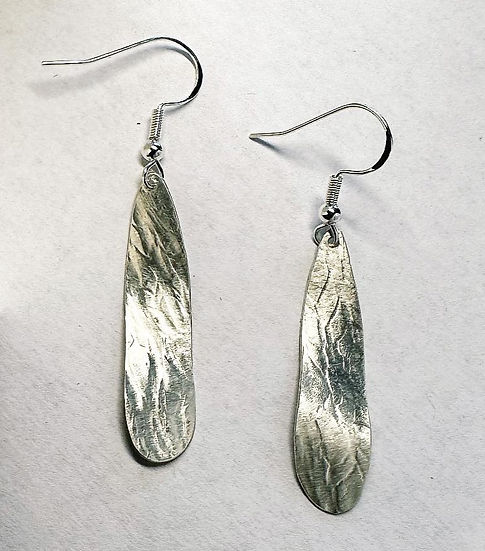 Silver Embossed Heli Seed Earrings by Michele Bianchi