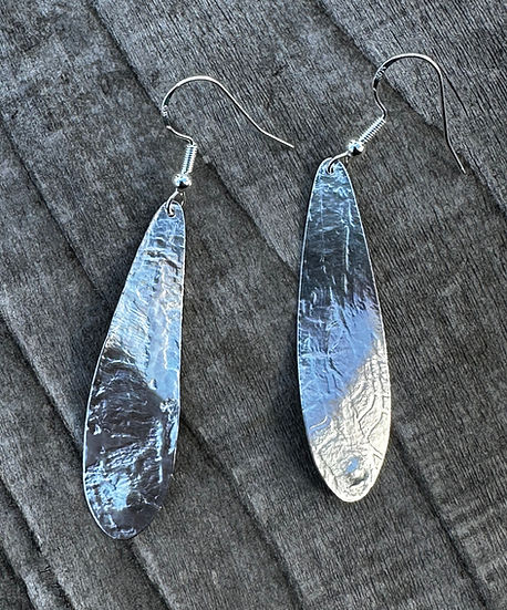 Silver Embossed Heli Seed Earrings by Michele Bianchi