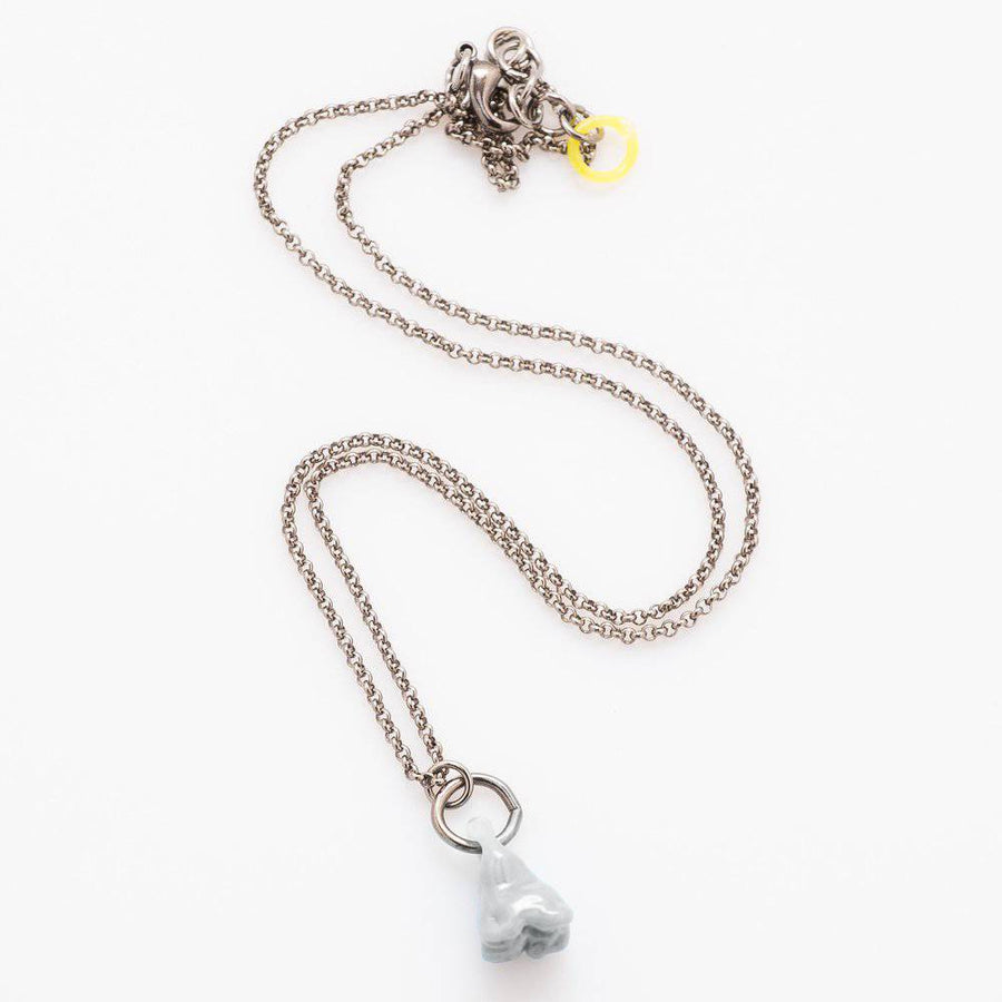 Glass Molar Tooth Necklace by Inna Patina