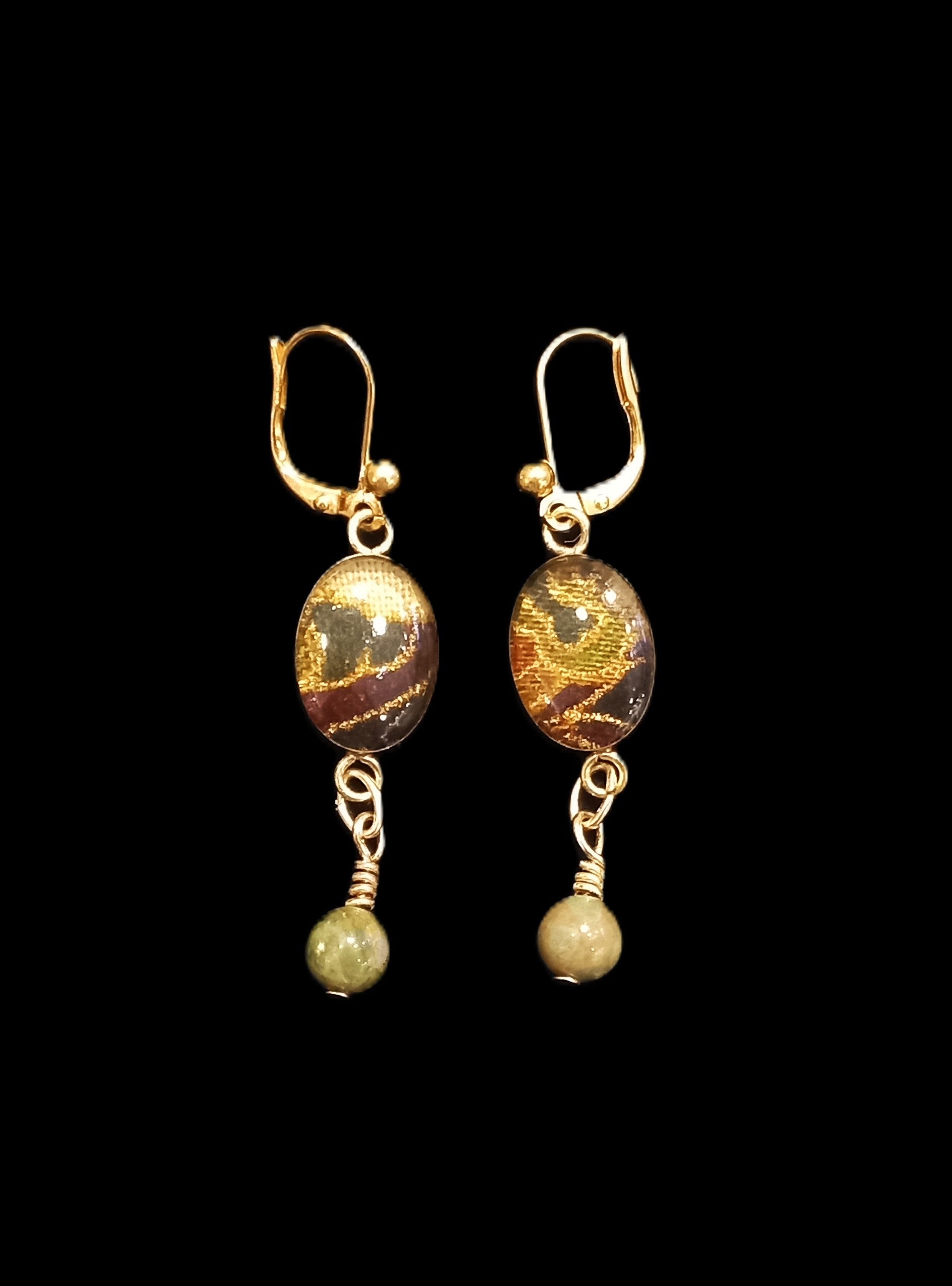 Earrings by Heidi Jack