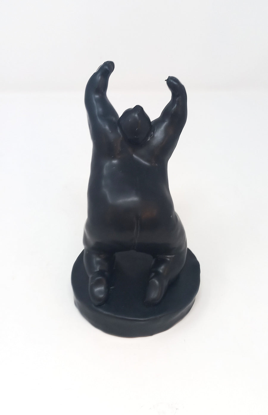 Kneeling and Reaching Toward the Sun by Tomoko Suzuki