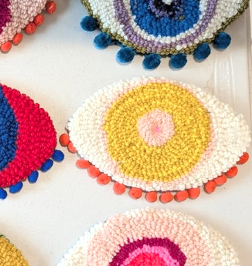 Tufted Evil Eyes by Trisha Gilmore