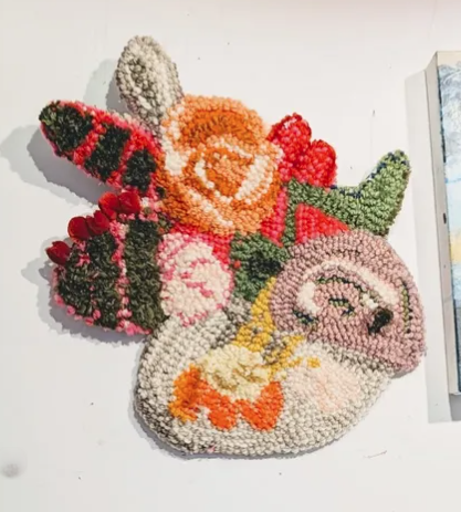 Tufted Floral and Red Pom Pom Wall Hanging