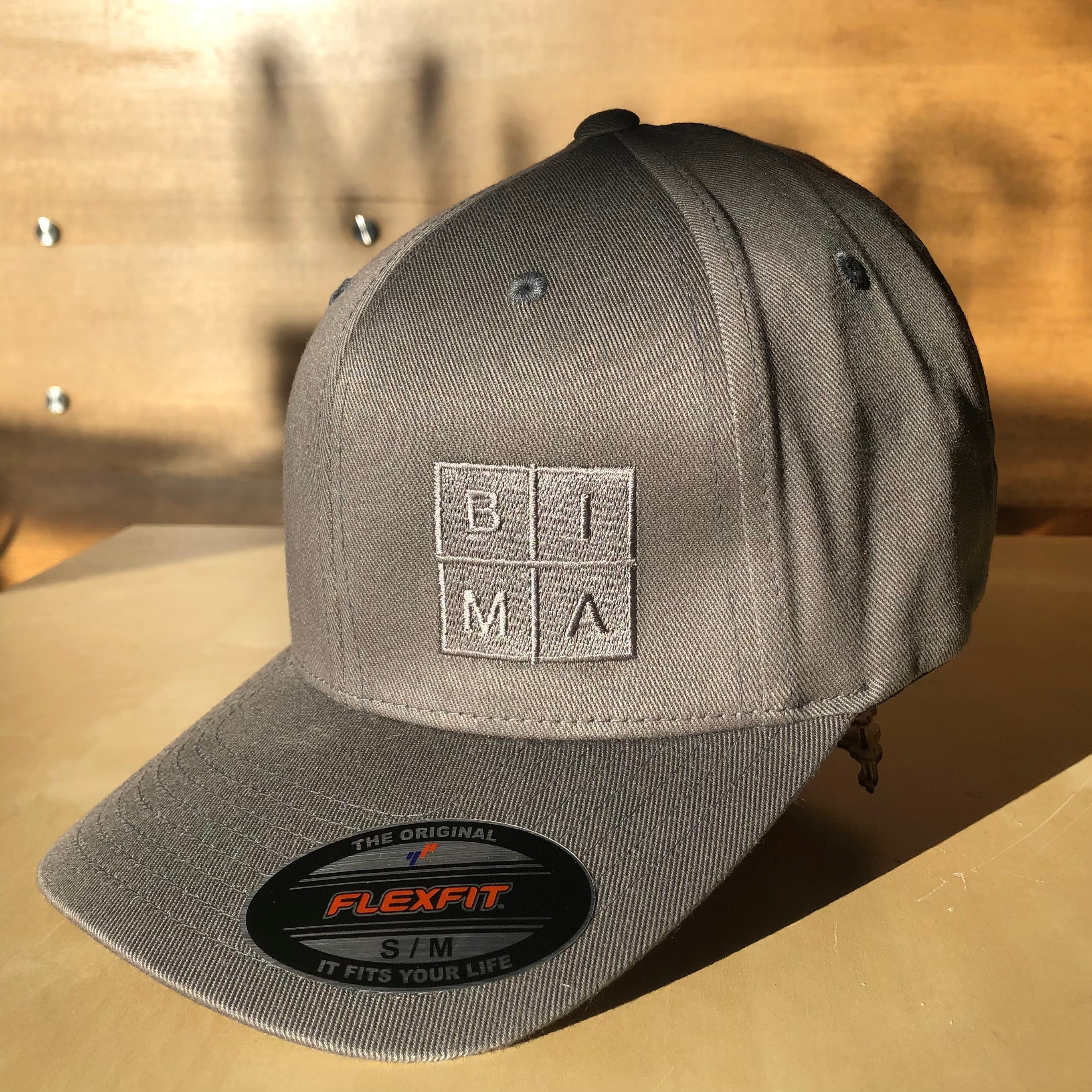 BIMA Logo Flexfit Cap in Grey